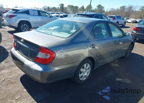 2003 Toyota Camry Le z USA, uszkodzony, nr VIN JTDBE32K930149280